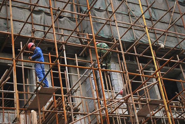 Workers on scaffolding during renovation